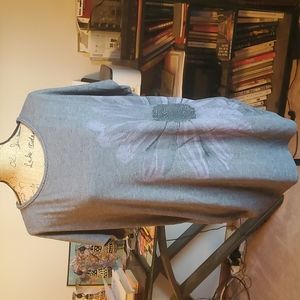 Maurices size 2 charcoal gray top with rouged sides and big flower on front left